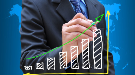 photodune-1699487-businessman-hand-drawing-business-graph-m